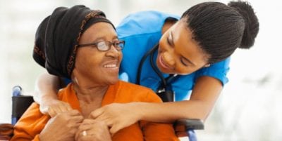 compassionate nurse with client